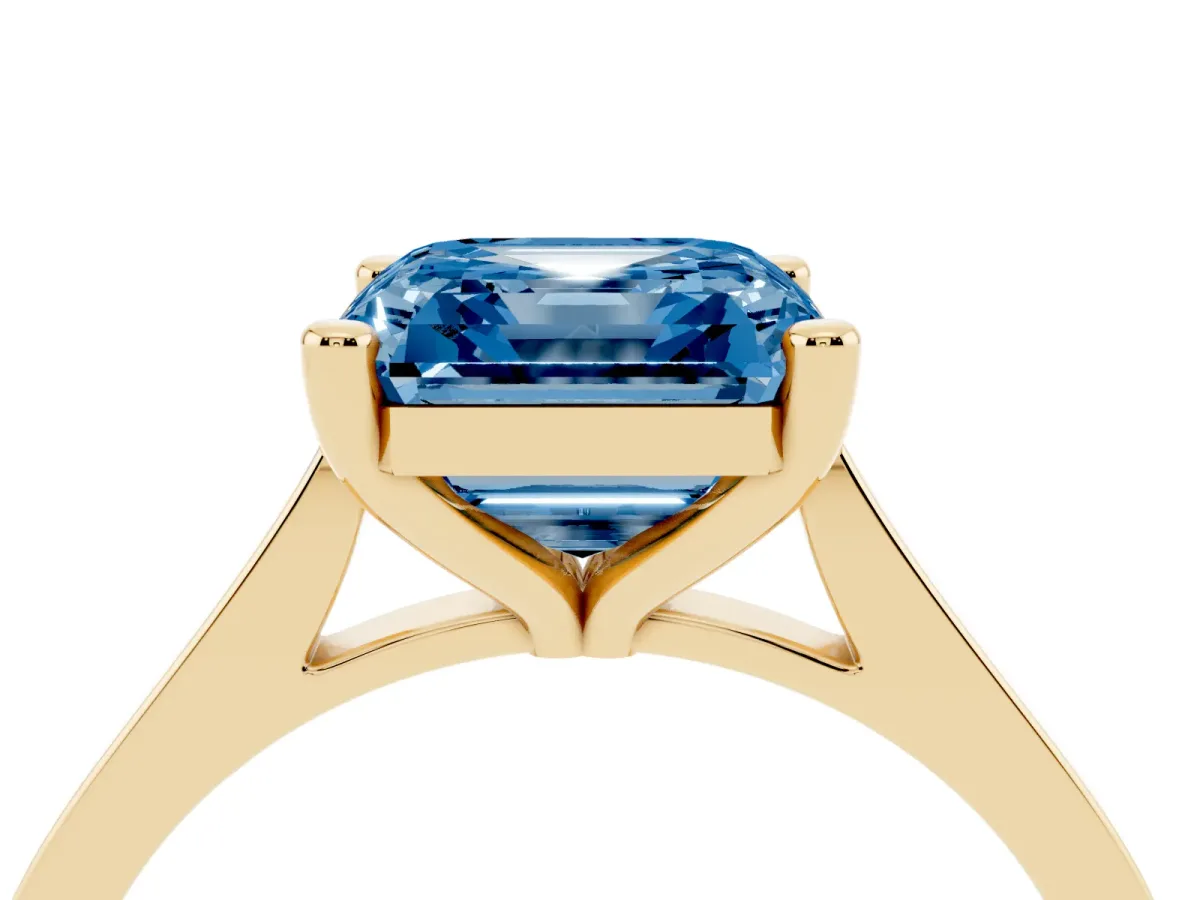 Fancy Blue Asscher Cut Solitaire Diamond Ring with Four-Prong Setting and Tapered Band Yellow gold