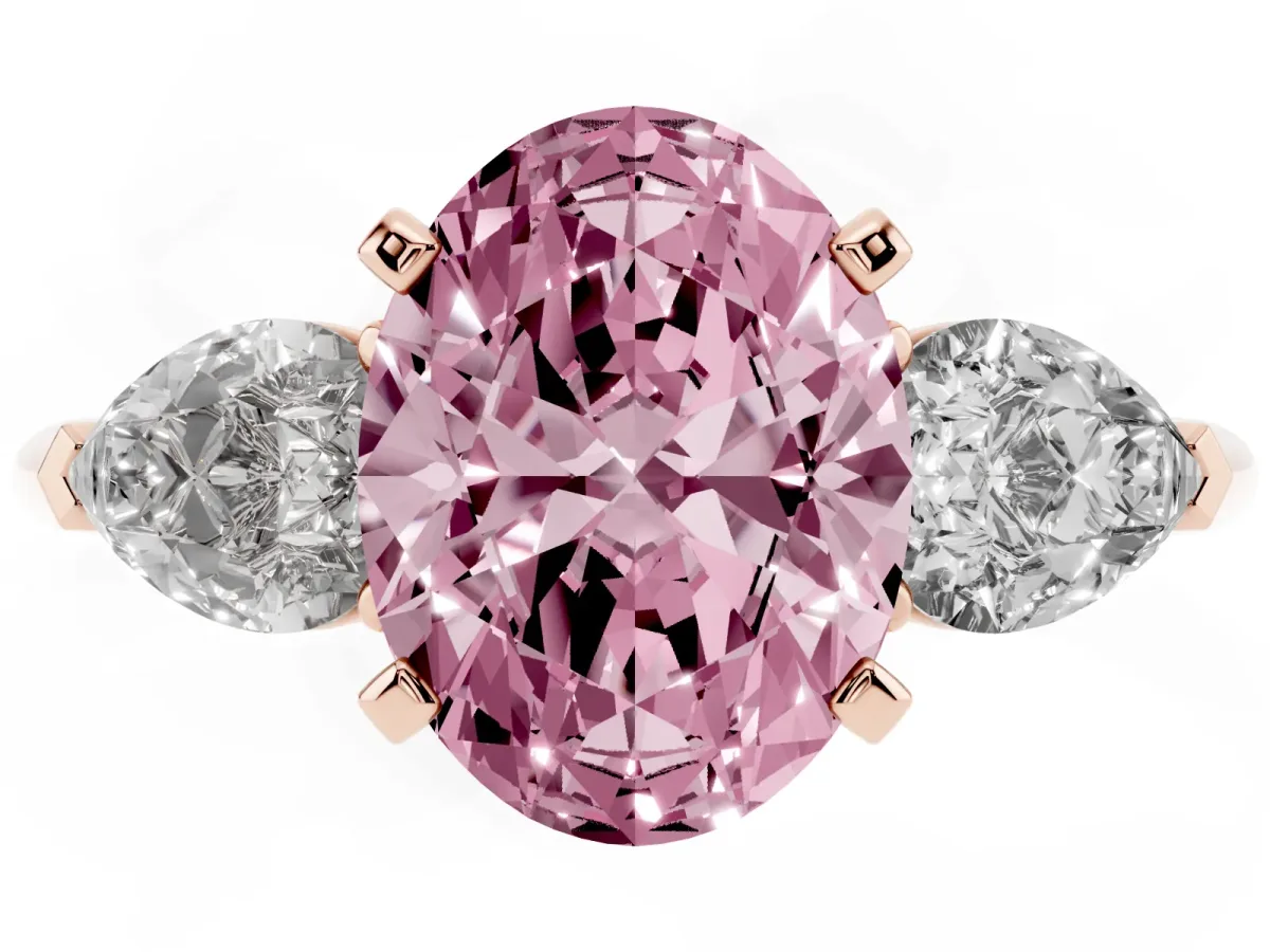 Fancy Pink Three-Stone Oval Cut Diamond Ring with Pear Side Stones and Four-Prong Setting Rose gold