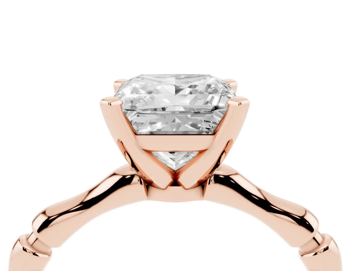 Princess Cut Solitaire Diamond Ring with Bamboo Band and Four-Prong Setting Rose gold