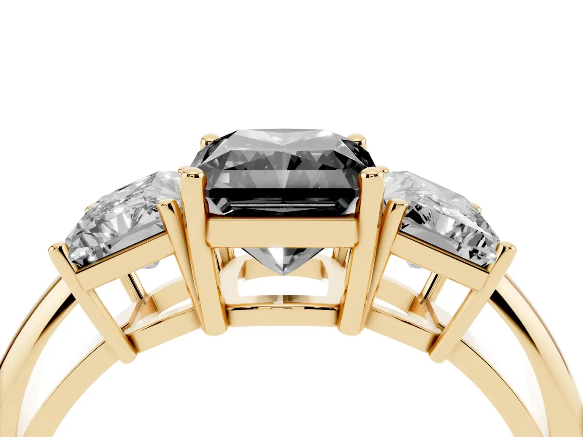 Fancy Black Three-Stone Radiant Cut Cut Diamond Engagement Ring with Prong Setting on a White Gold Band Yellow gold
