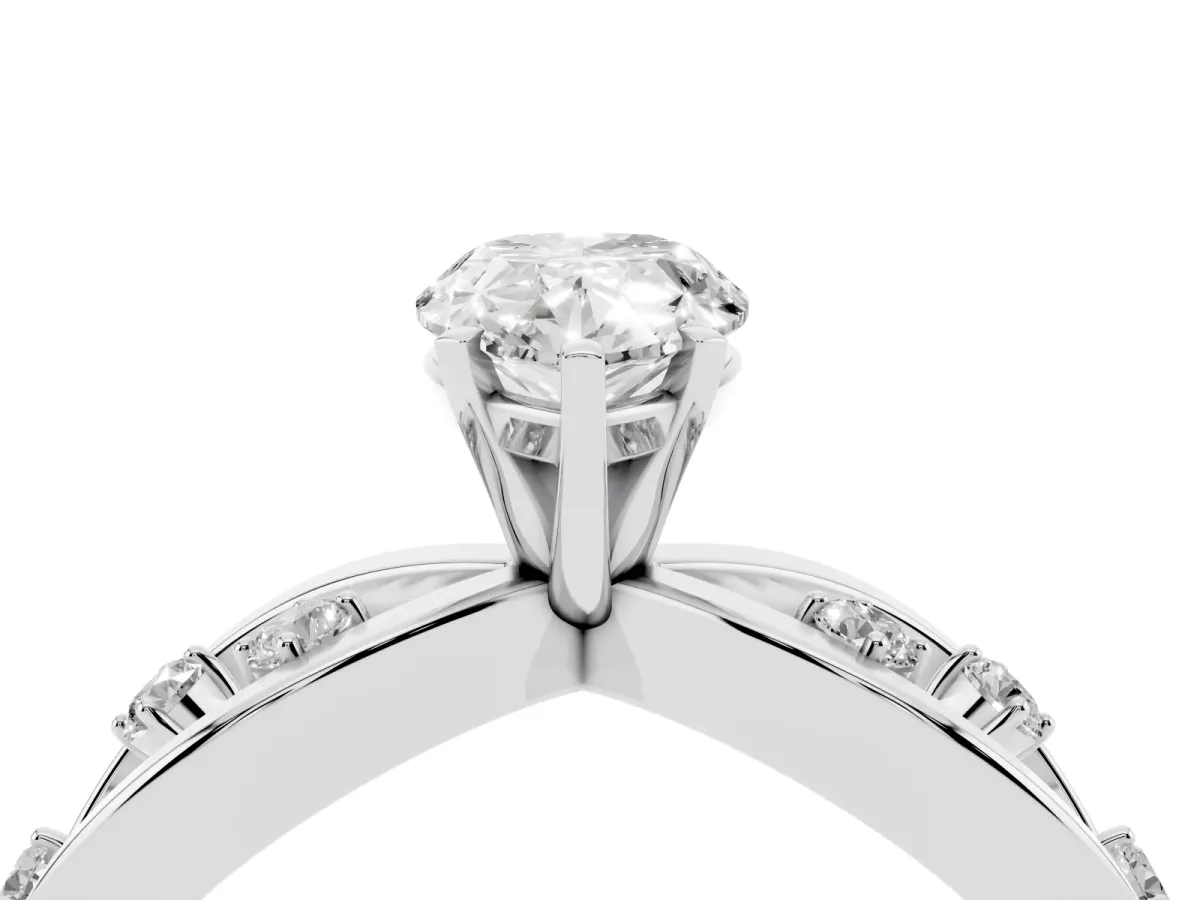 Pear Cut Cut Solitaire Diamond with Side Stones on Criss-Cross Band and Four-Prong Setting Silver