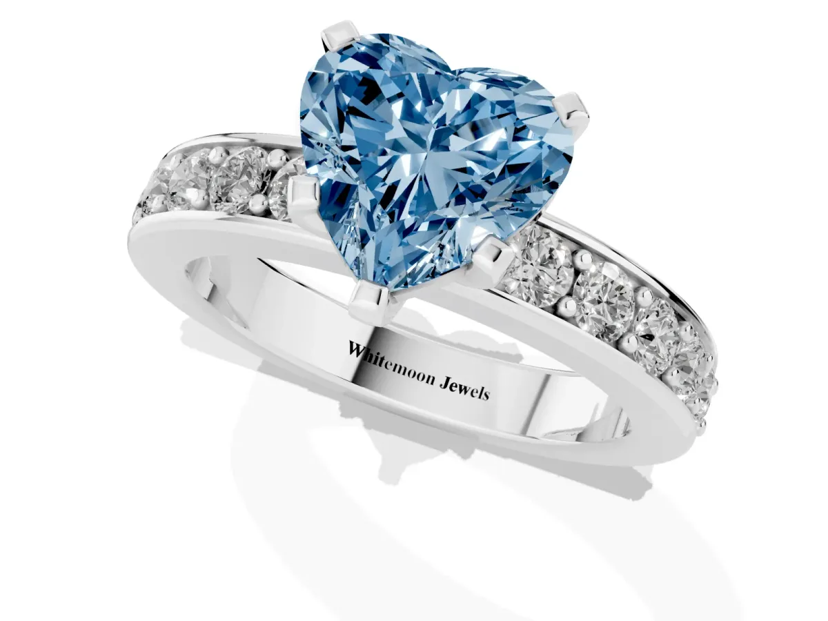 Fancy Blue Heart Cut Diamond Engagement Ring with Channel Set Round Band and Prong Setting Silver