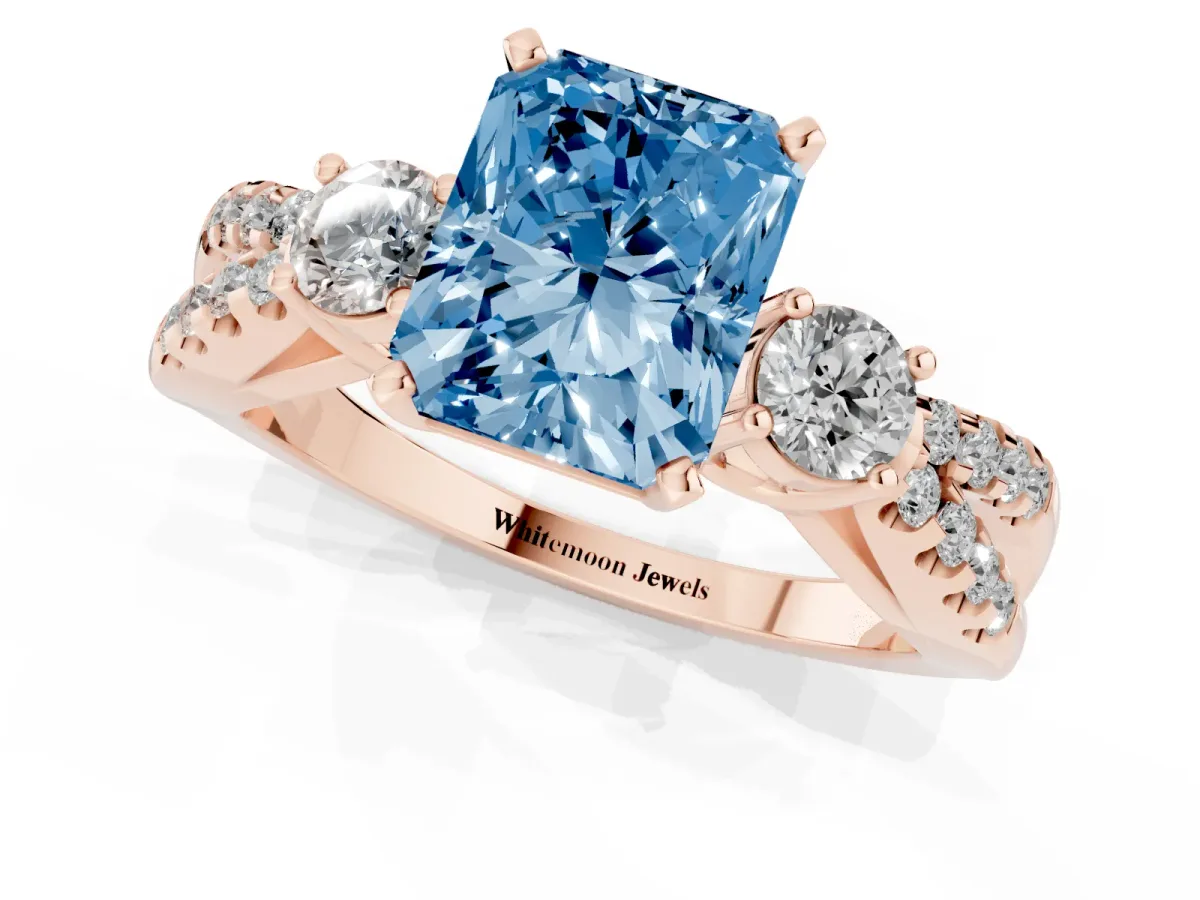 Fancy Blue Radiant Cut Diamond Three-Stone Ring with Pavé Split Shank and Four-Prong Setting Rose gold