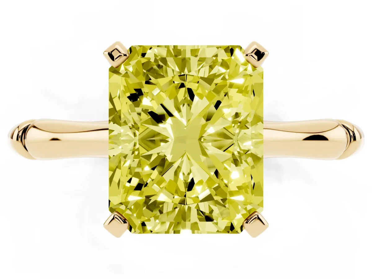 Fancy Yellow Radiant Cut Solitaire Diamond Ring with Bamboo Band and Four-Prong Setting Yellow gold