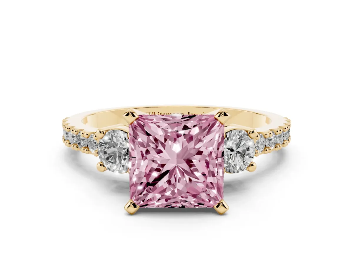 Fancy Pink Princess Cut Three-Stone Diamond Pavé Band with Prong Setting Yellow gold