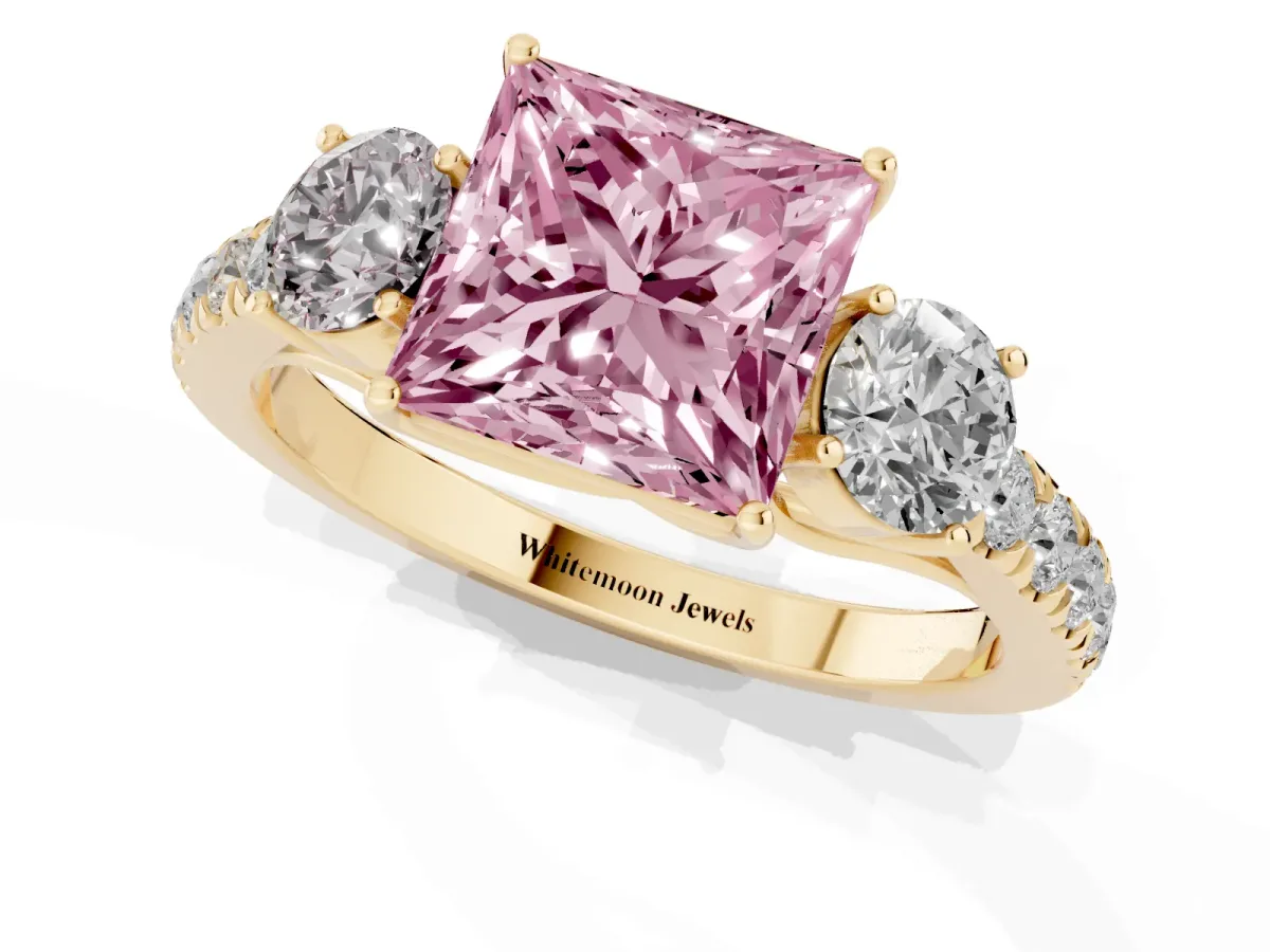 Fancy Pink Princess Cut Cut Diamond Three-Stone Ring with Round Side Stones and Pavé Band Yellow gold