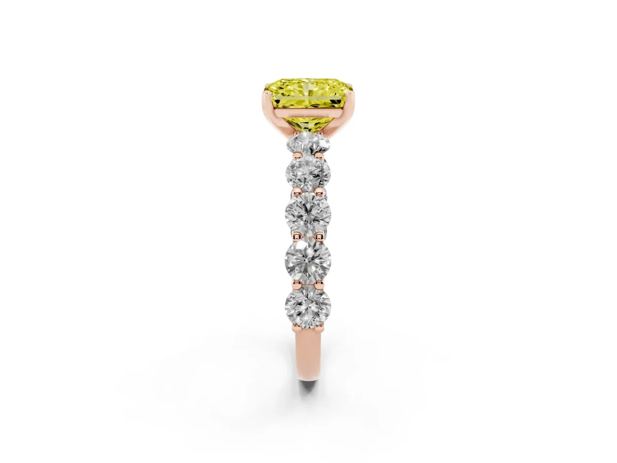 Fancy Yellow Radiant Cut Diamond Prong Setting with Side Stones on a Pave Band Rose gold