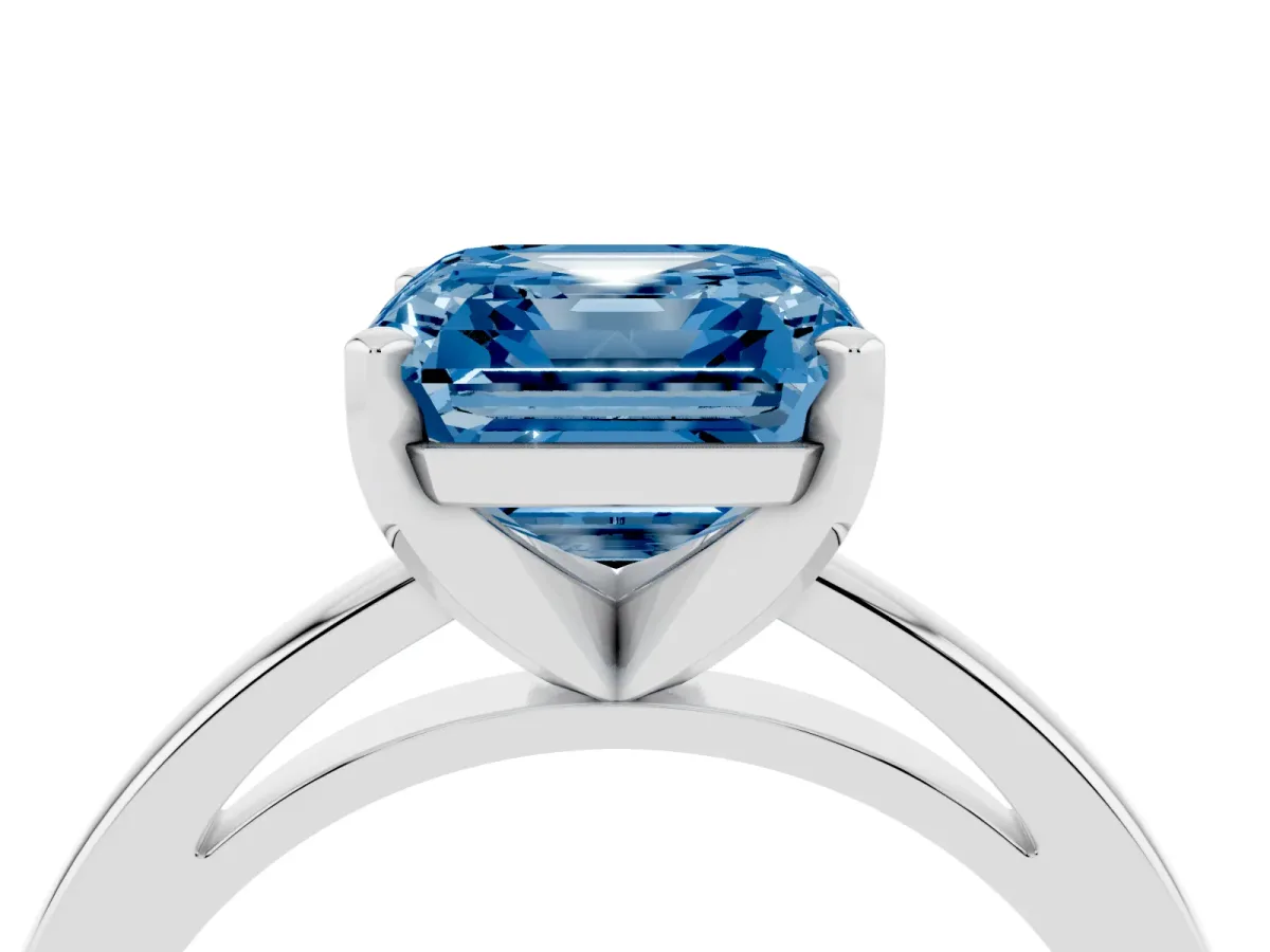 Fancy Blue Asscher Cut Solitaire Diamond Engagement Ring with Four-Prong Setting on a Classic Band Silver