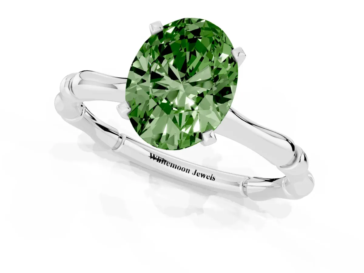 Fancy Green Oval Cut Solitaire Diamond Ring with Bamboo Band and Four-Prong Setting Silver