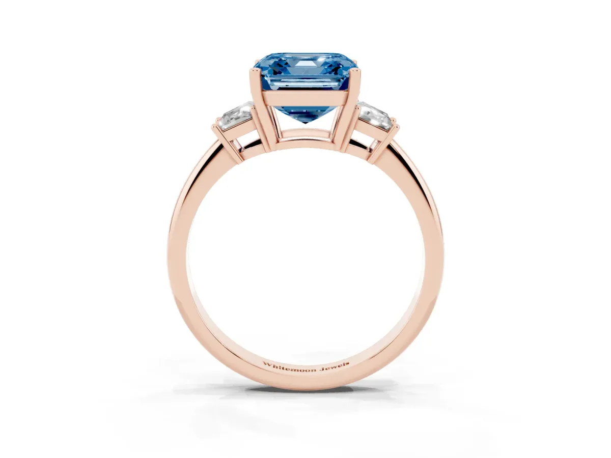 Fancy Blue Asscher Cut Diamond Three-Stone Ring with Trapezoid Side Stones and Prong Setting Rose gold