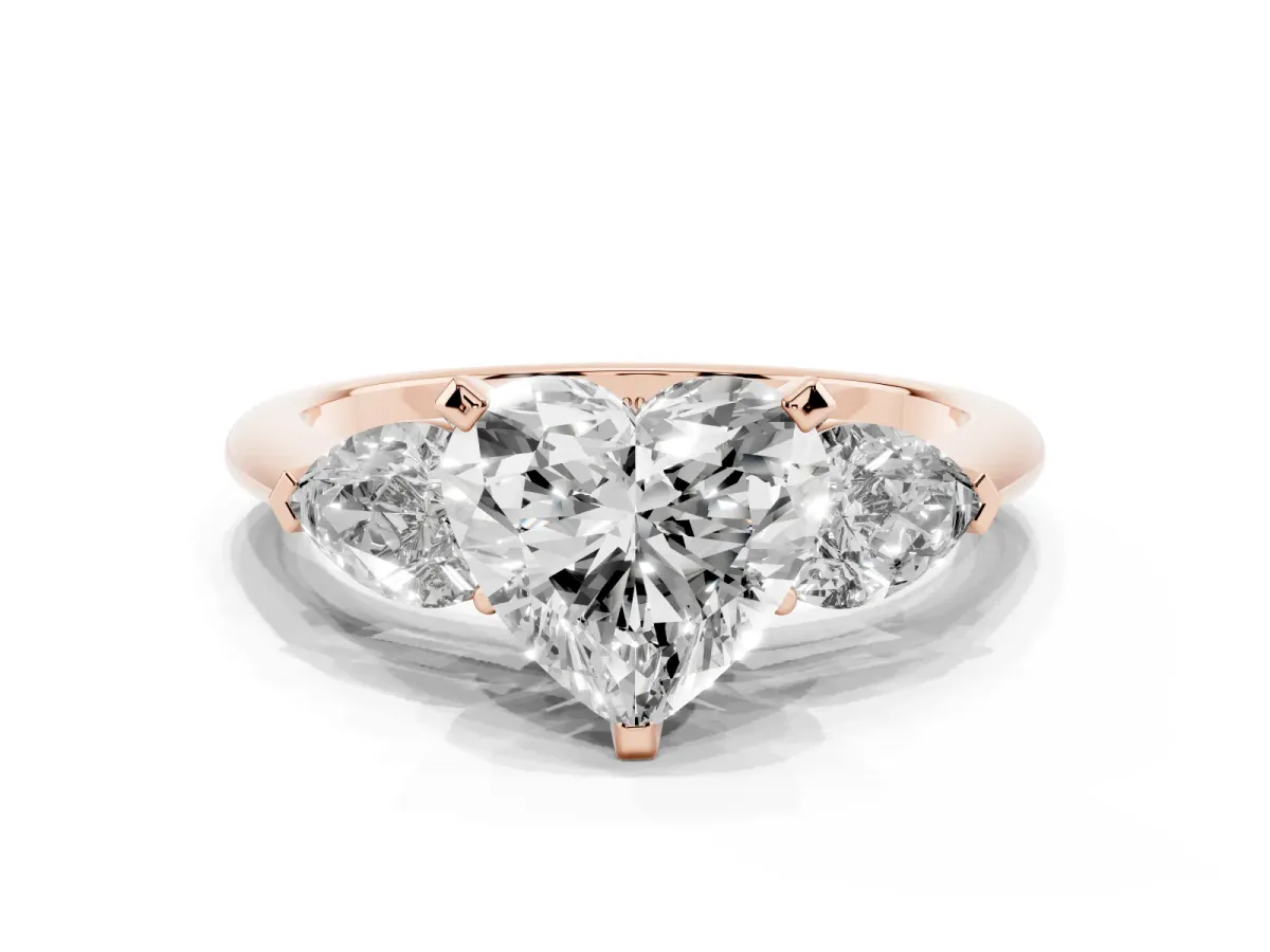 Three-Stone Heart Cut Diamond Ring with Pear Side Stones and Four-Prong Setting Rose gold