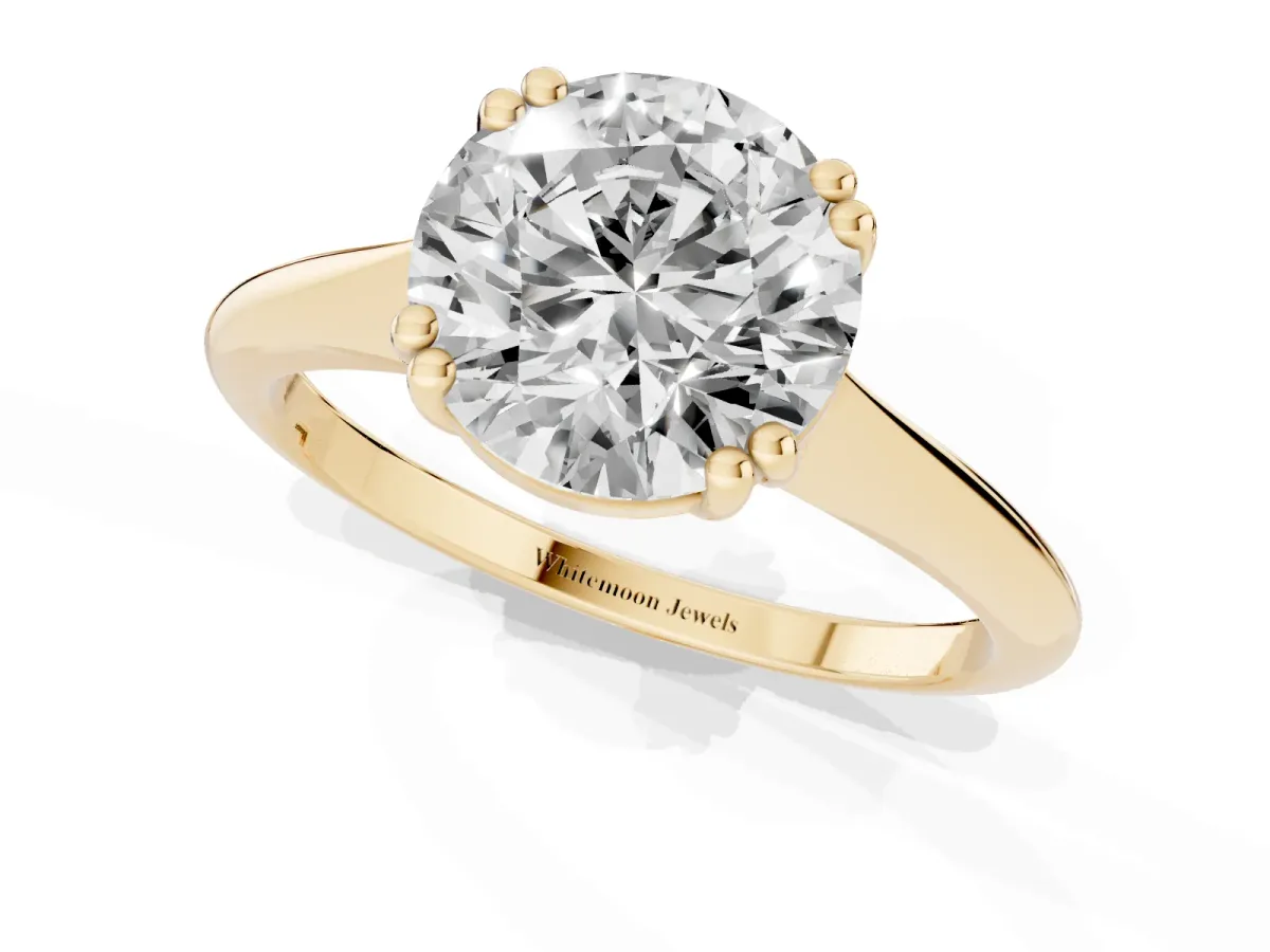 Round Cut Solitaire Diamond Ring with Six-Prong Setting and Classic Band Yellow gold