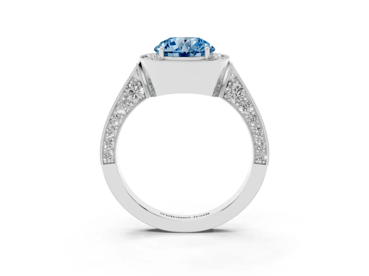 Fancy Blue Round Cut Halo Diamond Engagement Ring with Split Shank Band and Four-Prong Setting Silver