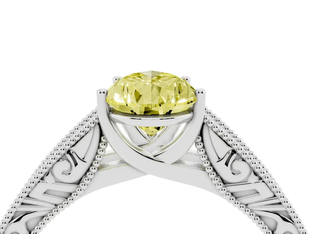 Fancy Yellow Pear Cut Diamond Solitaire Ring with Engraved Band and Four-Prong Setting Silver