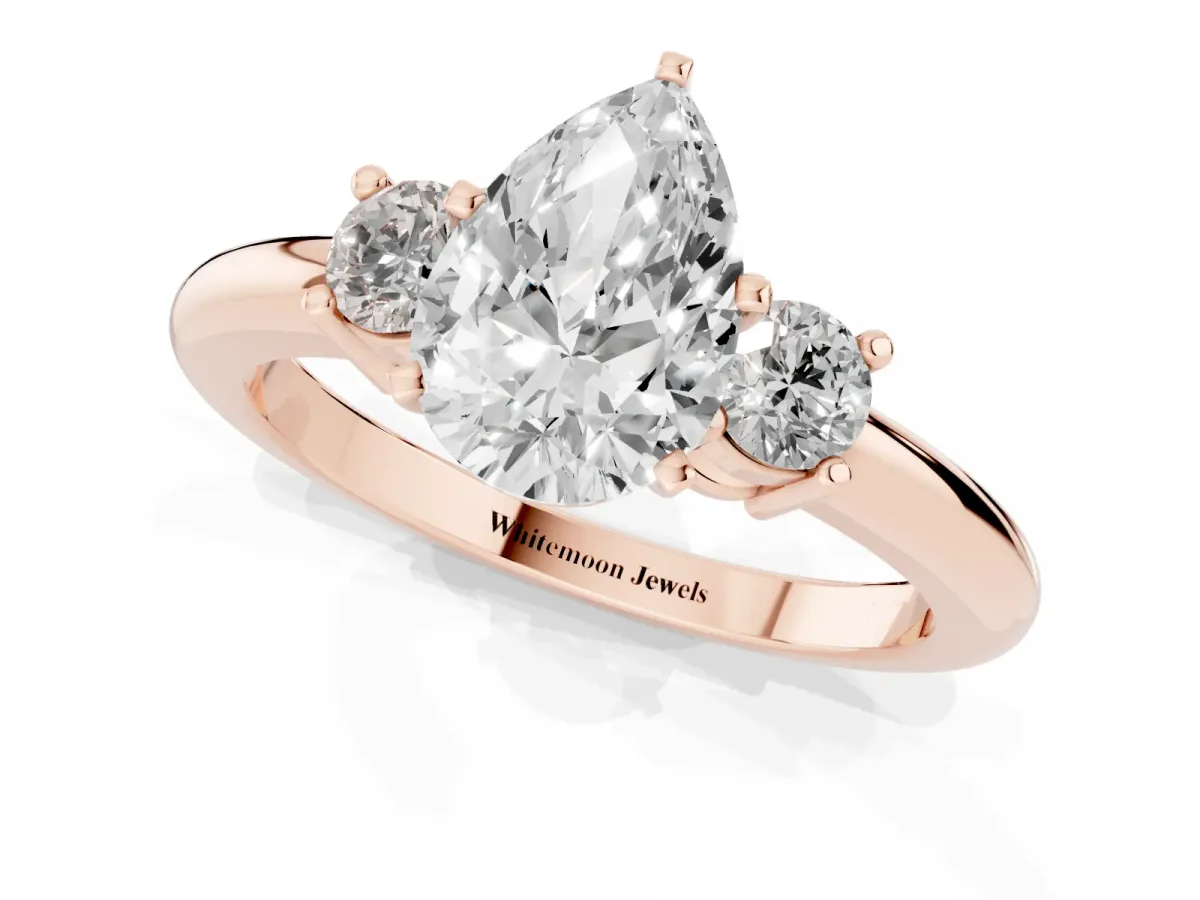 Three-Stone Pear Cut Cut Diamond Solitaire with Prong Setting and Classic Band Rose gold