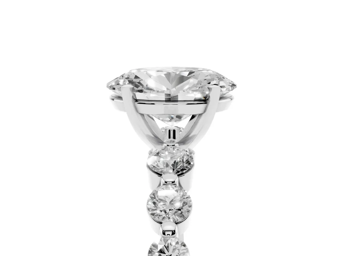 Oval Cut Solitaire Diamond Ring with Pave Band and Four-Prong Setting Silver