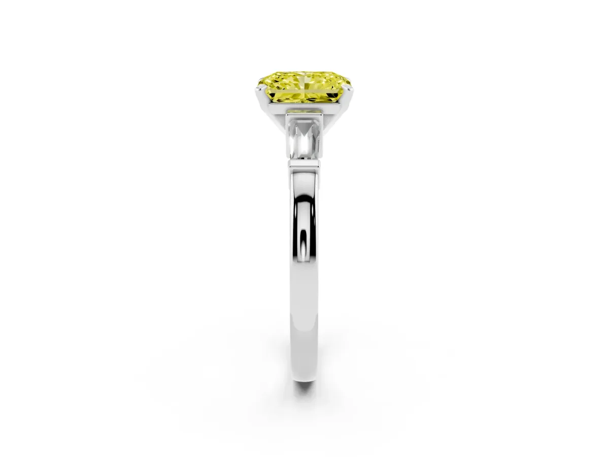 Fancy Yellow Radiant Cut Cut Diamond Solitaire Ring with Tapered Baguette Accents and Four-Prong Setting White gold