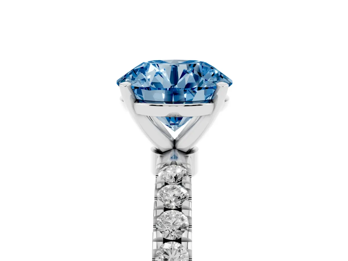 Fancy Blue Round Cut Diamond Solitaire Ring with Pavé Accents and Four-Prong Setting Platinum
