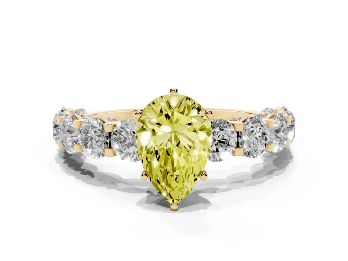 Fancy Yellow Pear Cut Diamond Side Stone Engagement Ring with Four-Prong Setting Yellow gold