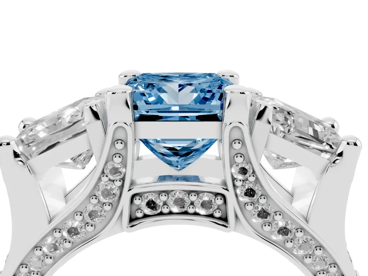 Fancy Blue Princess Cut Diamond Three-Stone Ring with Channel Set Band and Four-Prong Setting Silver