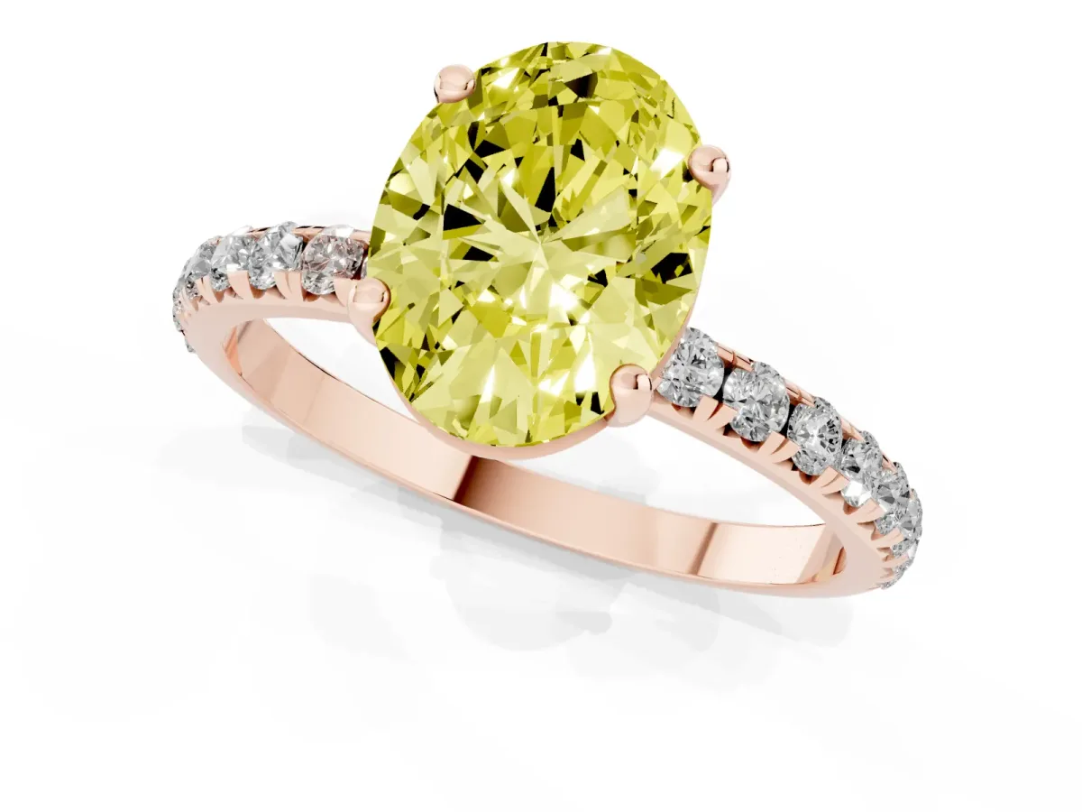 Fancy Yellow Oval Cut Cut Diamond Solitaire Ring with Micro Pave Band and Four Prong Setting Rose gold