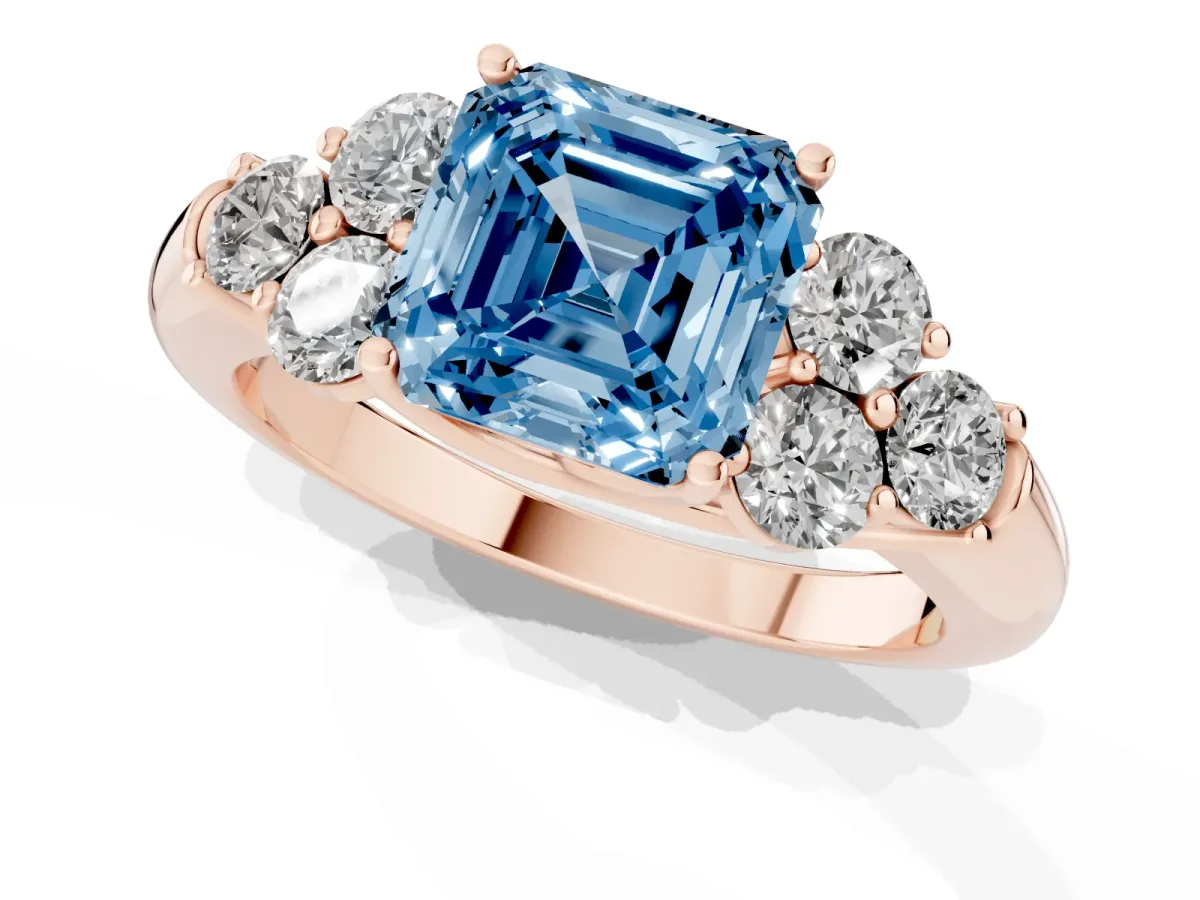 Fancy Blue Asscher Cut Cut Diamond Cluster Ring with Round Accent Stones and Prong Setting on a Classic Band Rose gold