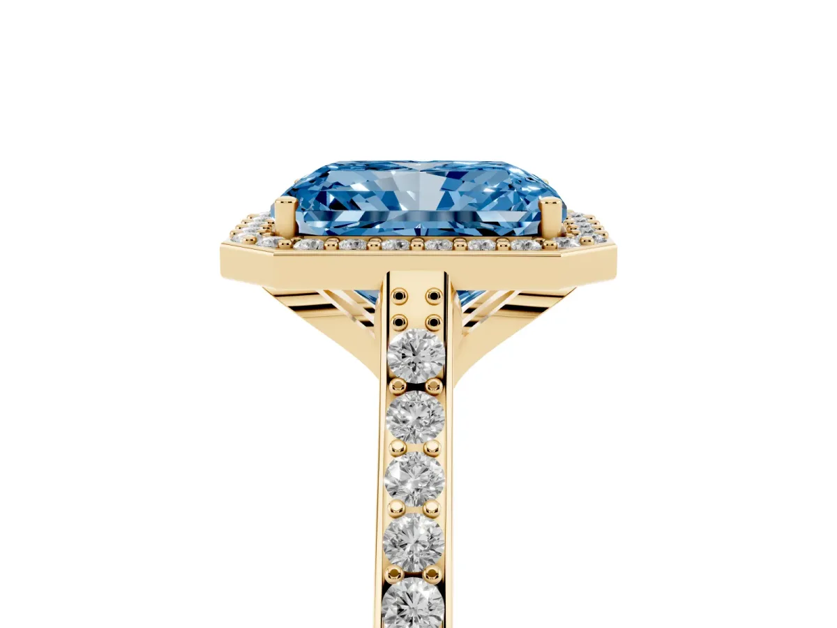 Fancy Blue Radiant Cut Diamond Halo Engagement Ring with Round Pavé Shoulders and Prong Setting Yellow gold