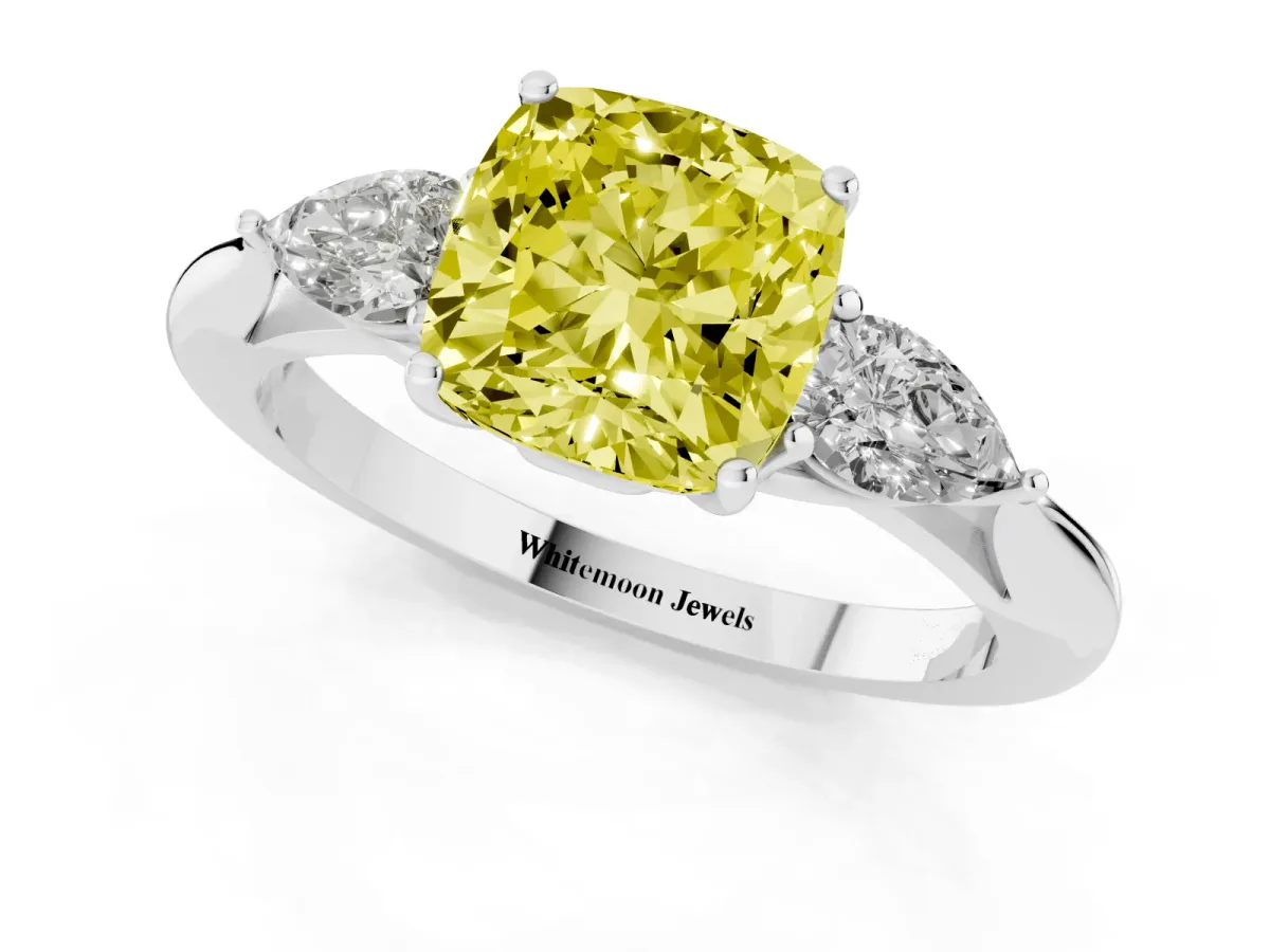 Fancy Yellow Cushion Cut Diamond Three-Stone Ring with Pear Side Stones and Prong Setting Platinum