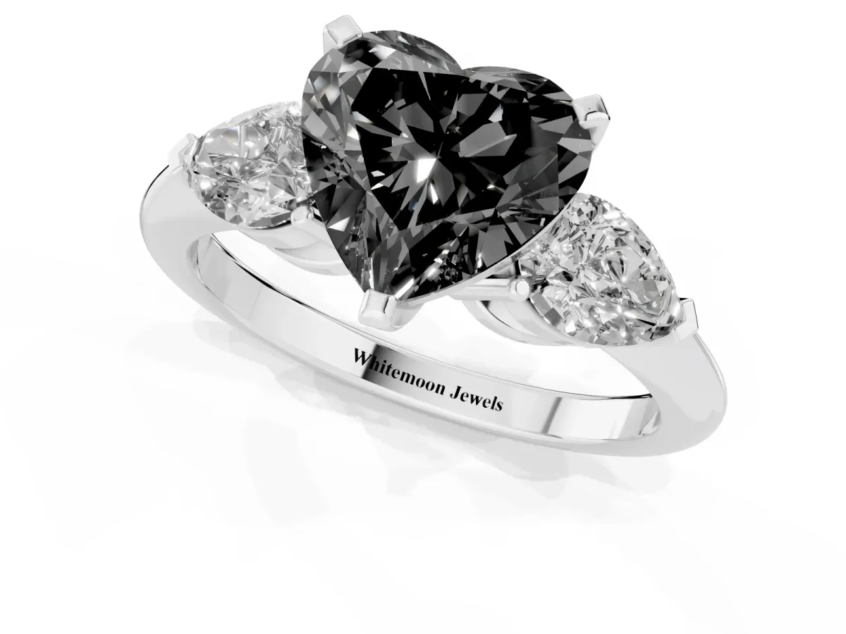 Fancy Black Three-Stone Heart Cut Diamond Ring with Pear Side Stones and Four-Prong Setting Silver