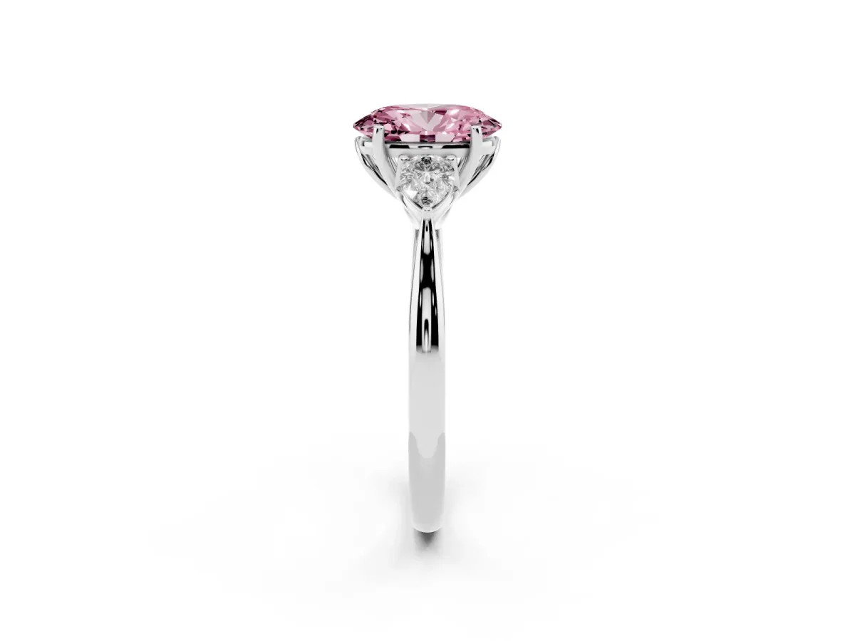 Fancy Pink Three-Stone Oval Cut Diamond Ring with Pear Side Stones in Four-Prong Setting Platinum