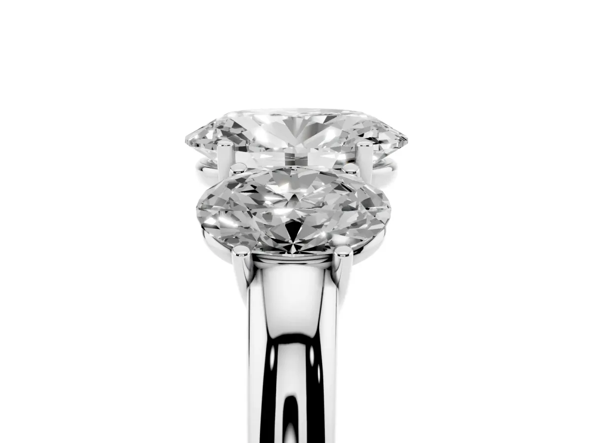 Oval Cut Diamond Three-Stone Ring with Four-Prong Setting and Classic Band Platinum