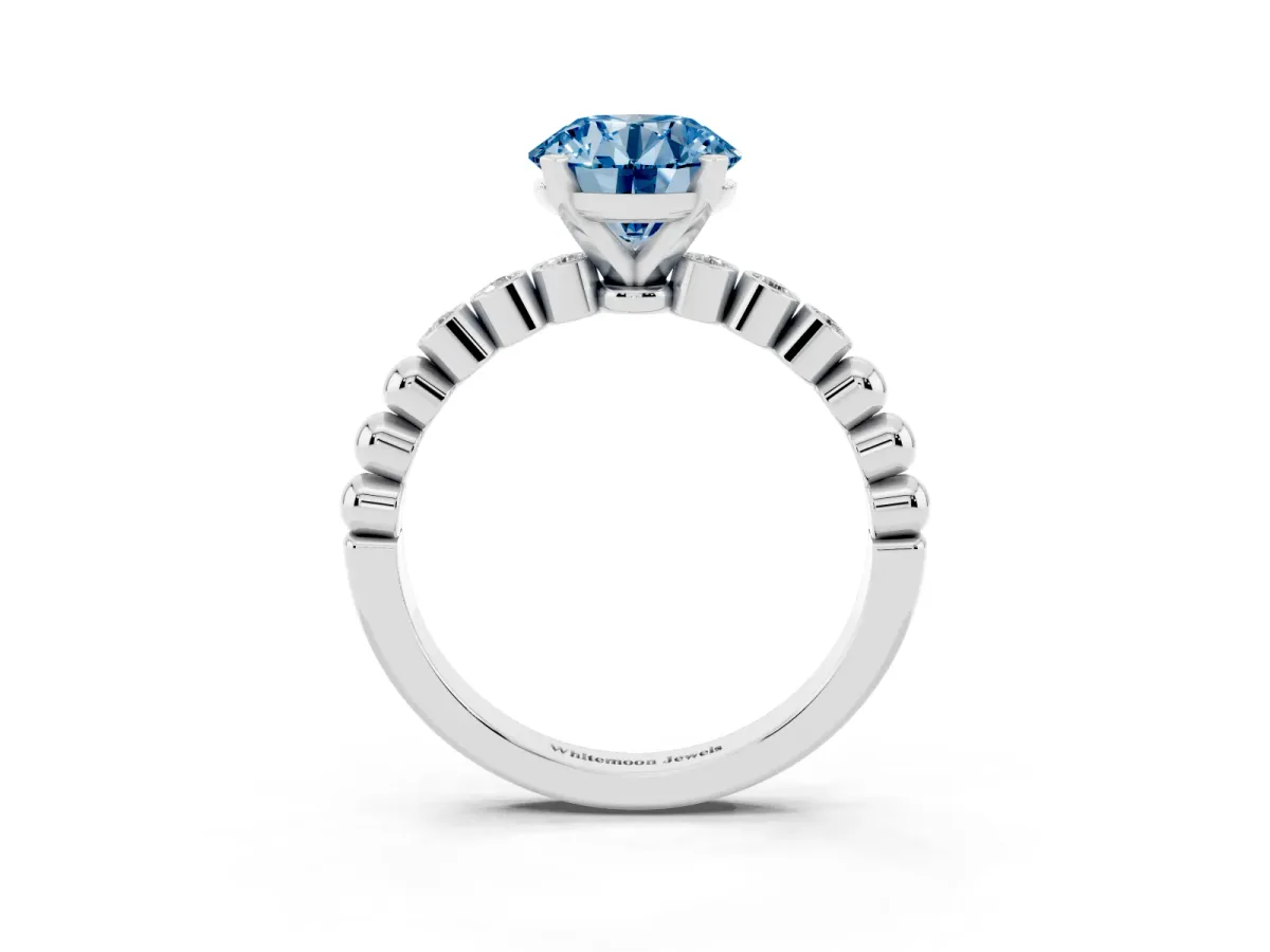 Fancy Blue Round Cut Solitaire Bezel Accent Diamond Engagement Ring with Beaded Band and Four-Prong Setting Silver