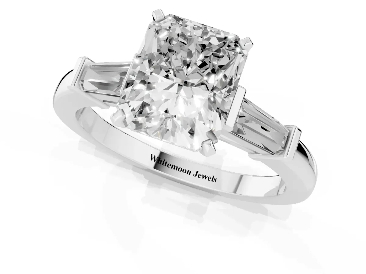 Radiant Cut Cut Diamond Solitaire Ring with Tapered Baguette Accents and Four-Prong Setting Silver