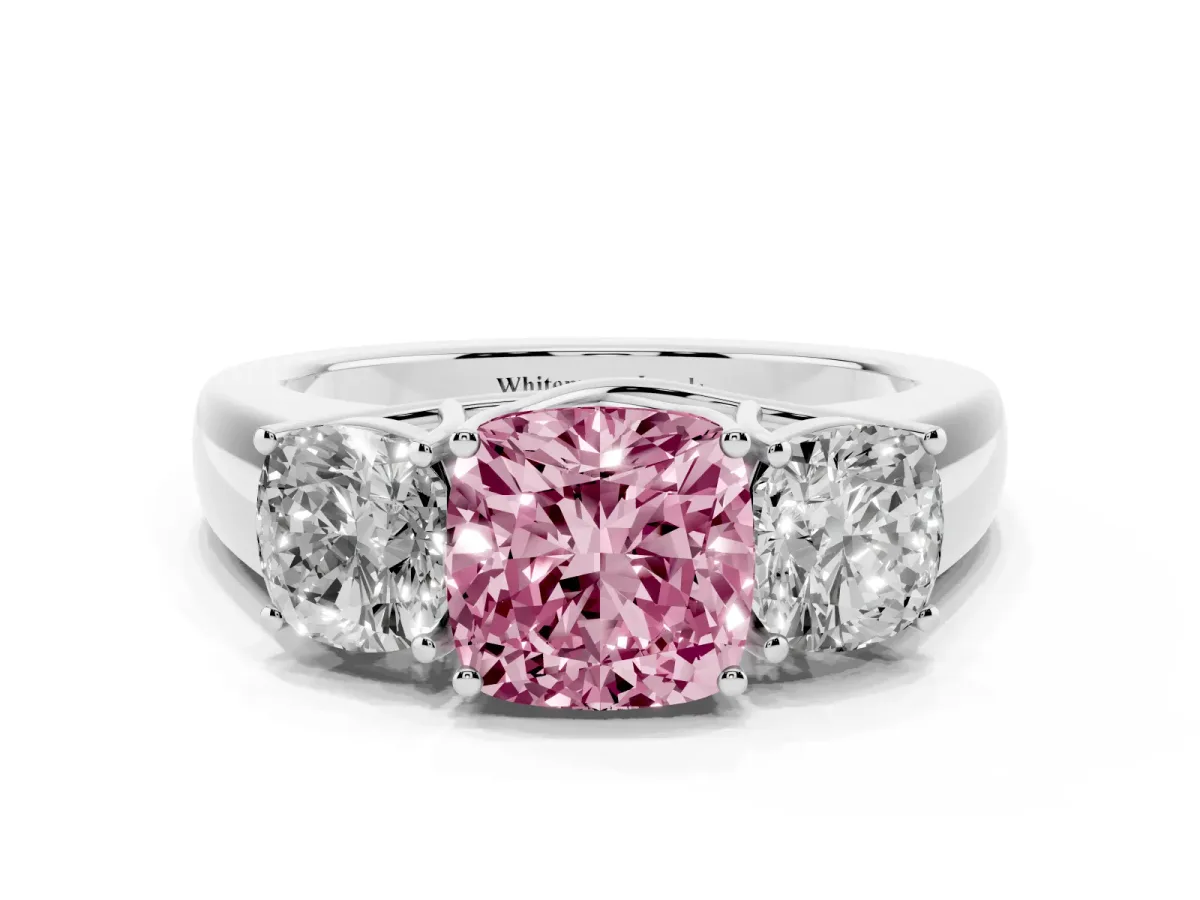 Fancy Pink Three-Stone Cushion Cut Cut Diamond Ring with Prong Setting and Classic Band Platinum
