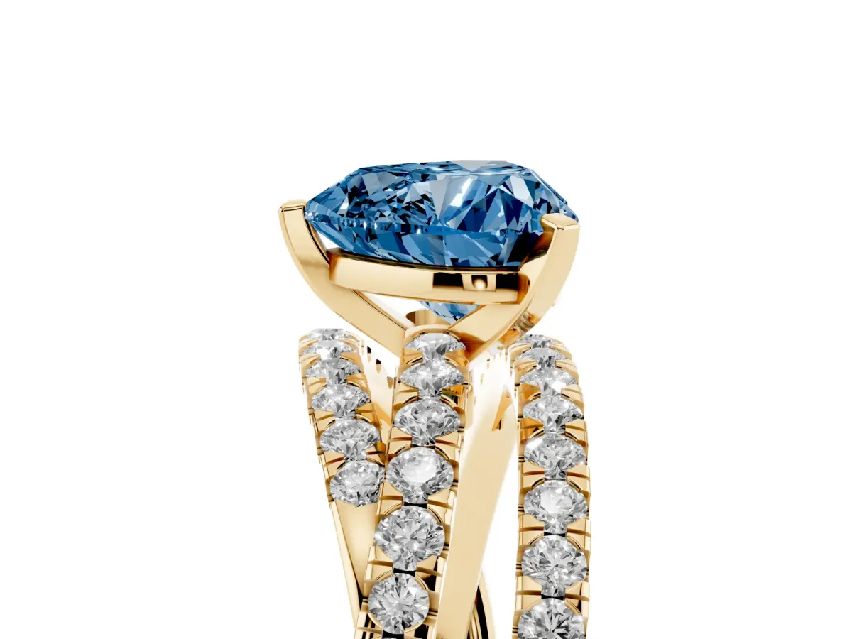 Fancy Blue Heart Cut Solitaire Twist Band with Pavé Setting and Four-Prong Setting Yellow gold