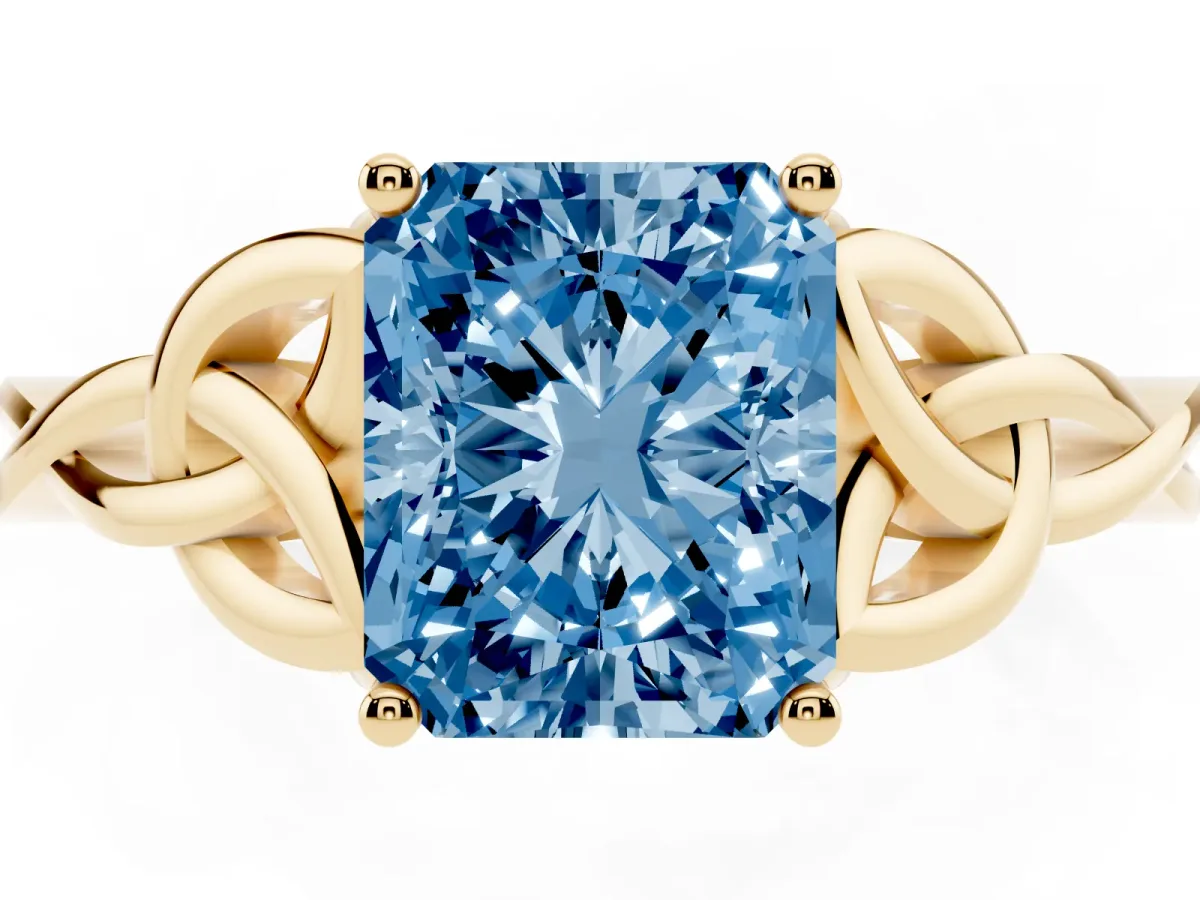 Fancy Blue Radiant Cut Diamond Solitaire Engagement Ring with Celtic Knot Band and Four-Prong Setting Yellow gold