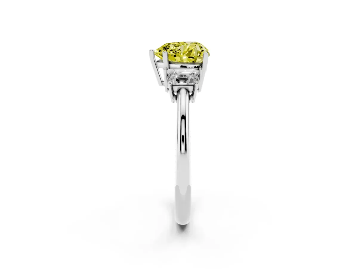 Fancy Yellow Heart Cut Diamond Three-Stone Ring with Trapezoid Side Stones and Prong Setting Silver