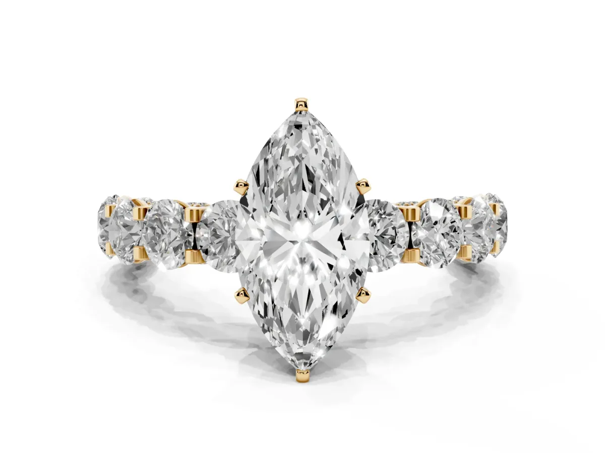 Marquise Cut Diamond Side Stone Engagement Ring with Four-Prong Setting Yellow gold