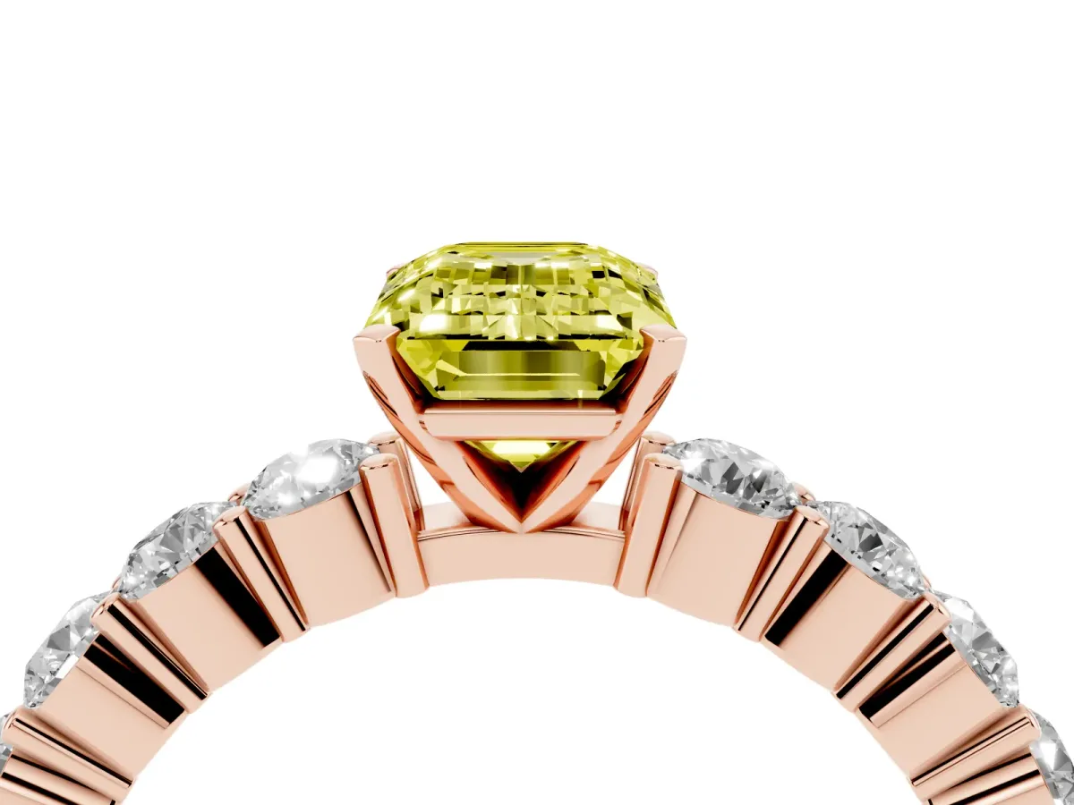 Fancy Yellow Emerald Cut Diamond Solitaire Ring with Shared Prong Round Side Stones Rose gold