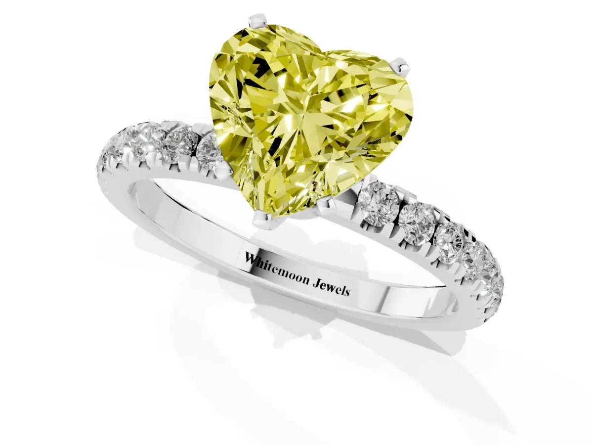Fancy Yellow Heart Cut Diamond Solitaire Ring with Pavé Accents and Four-Prong Setting Platinum