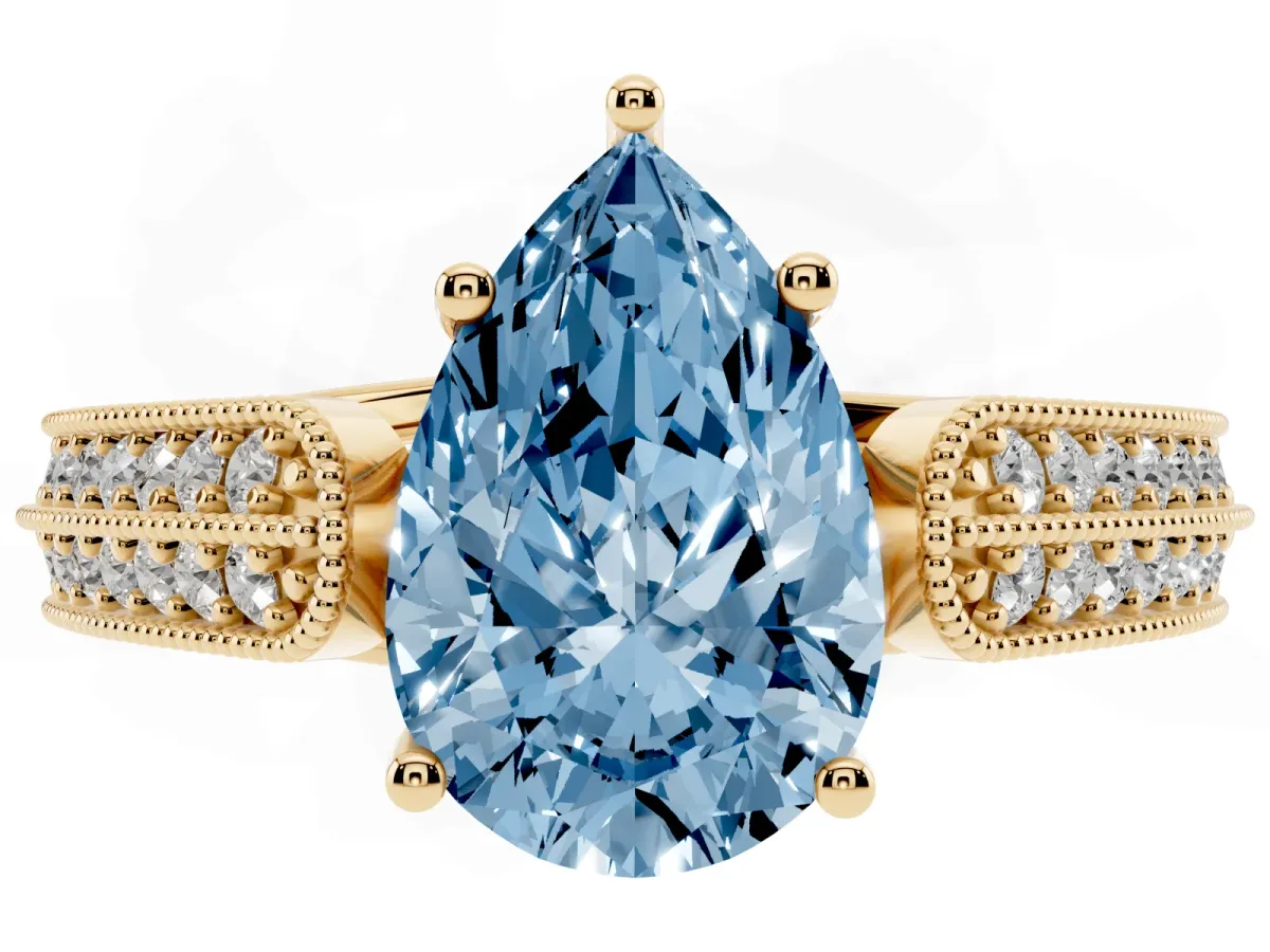 Fancy Blue Pear Cut Cut Pave Split Shank Engagement Ring with Four-Prong Setting Yellow gold