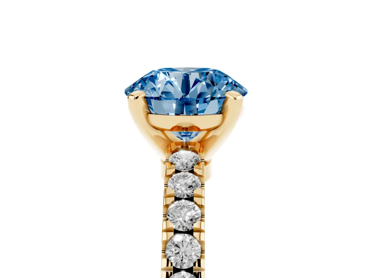 Fancy Blue Round Cut Solitaire Diamond with Pavé Band and Four-Prong Setting Yellow gold