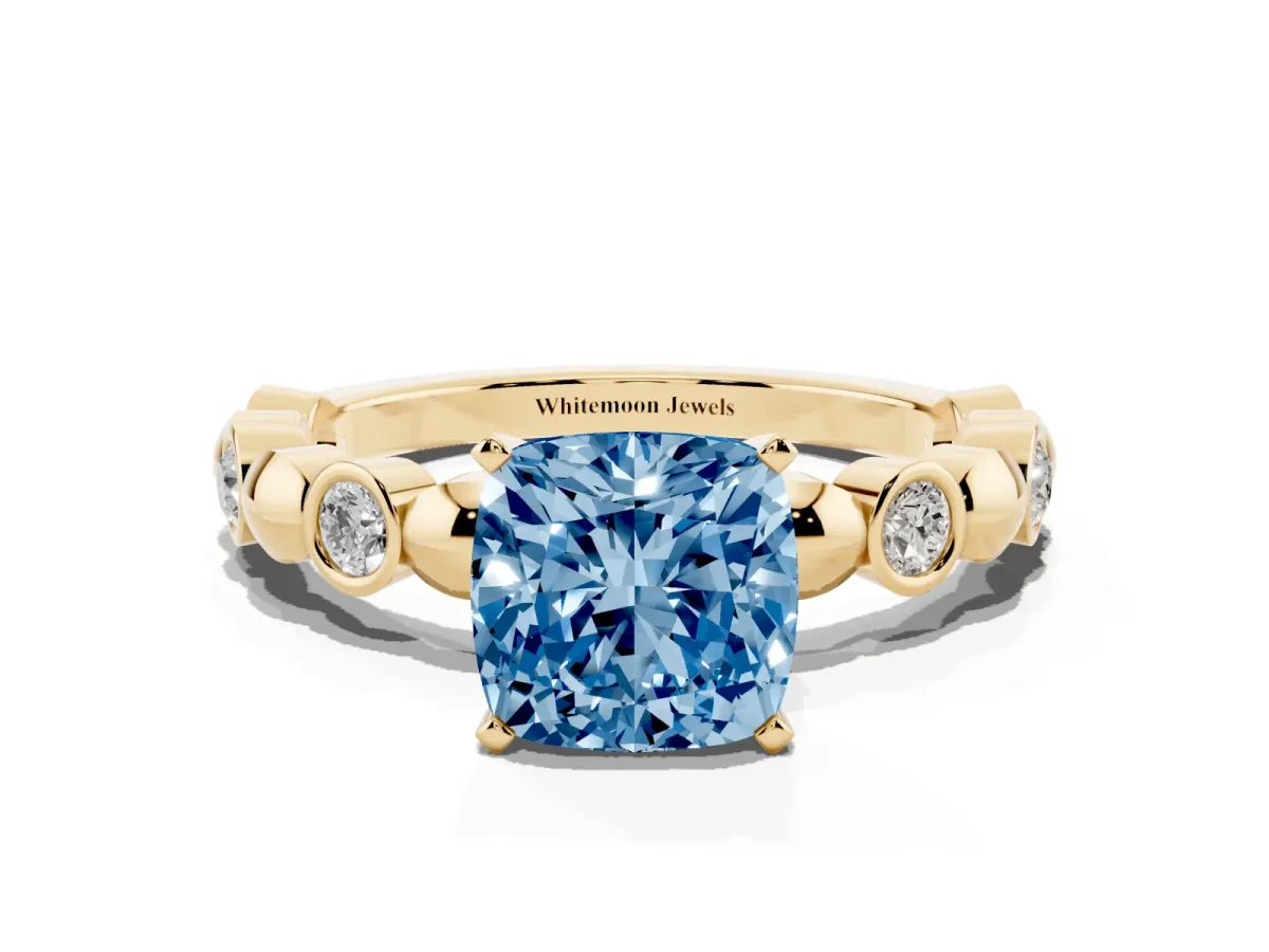 Fancy Blue Cushion Cut Solitaire Bezel-Set Diamond Ring with Beaded Band and Four-Prong Setting Yellow gold