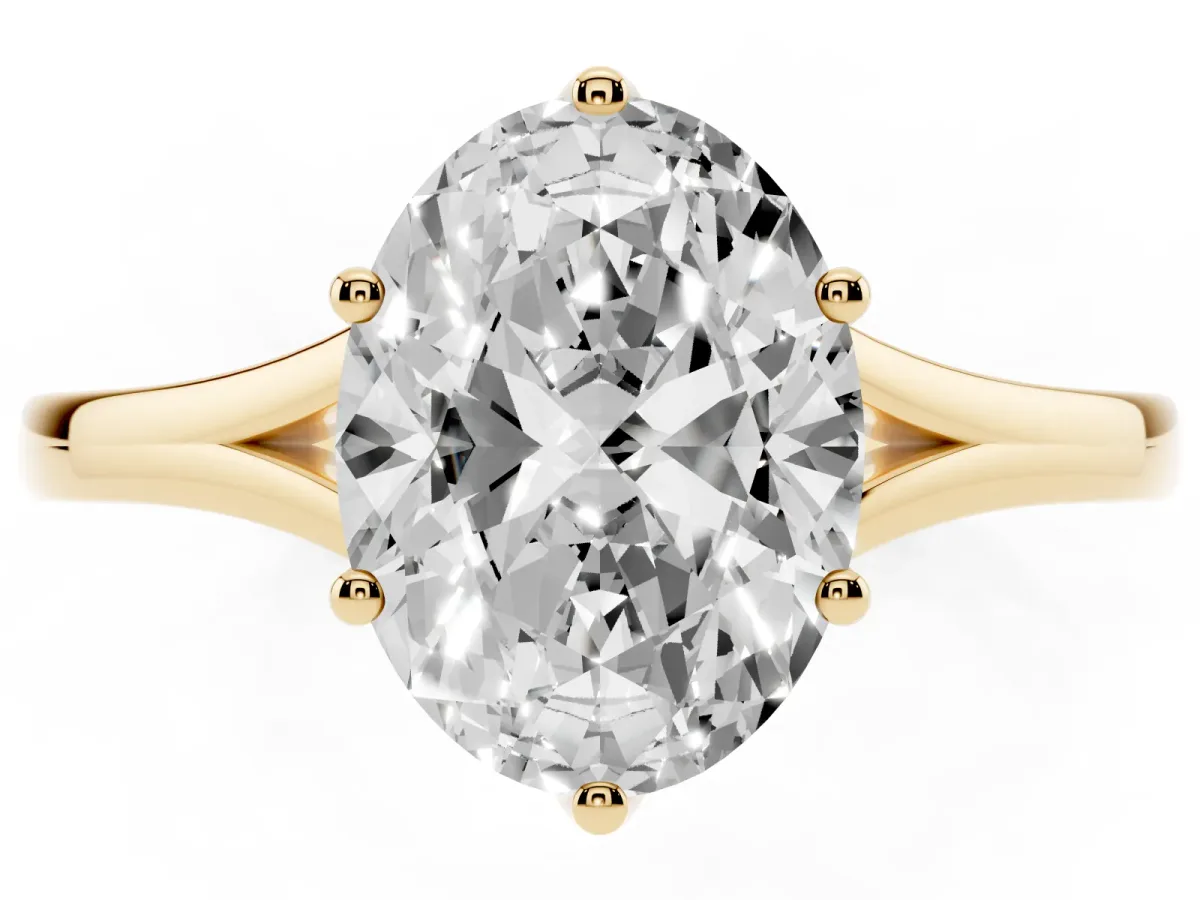 Oval Cut Solitaire Diamond Ring with Six-Prong Setting and Tapered Band Yellow gold