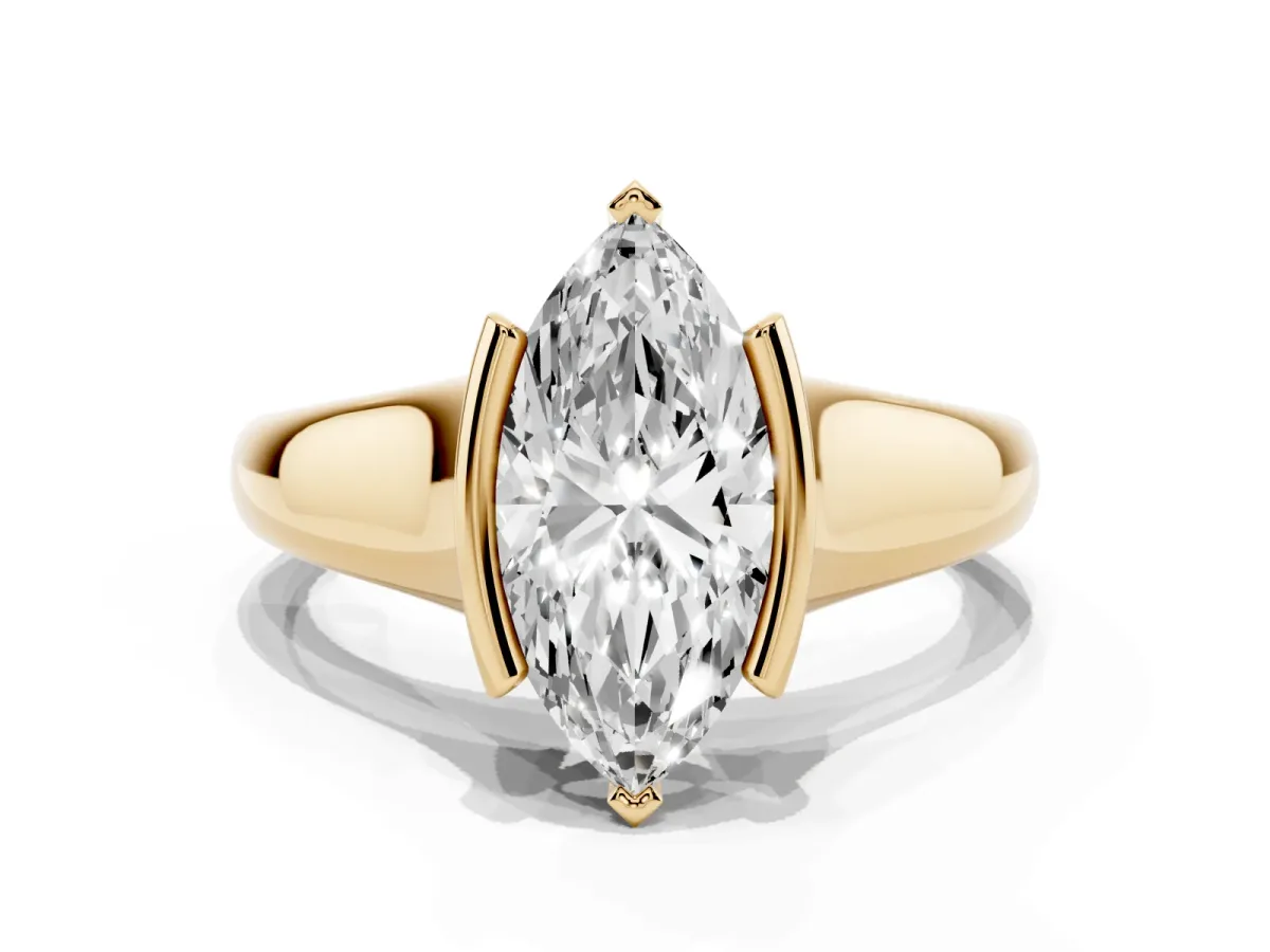 Marquise Cut Solitaire Tension Set Diamond Ring with Split Shank Band Yellow gold