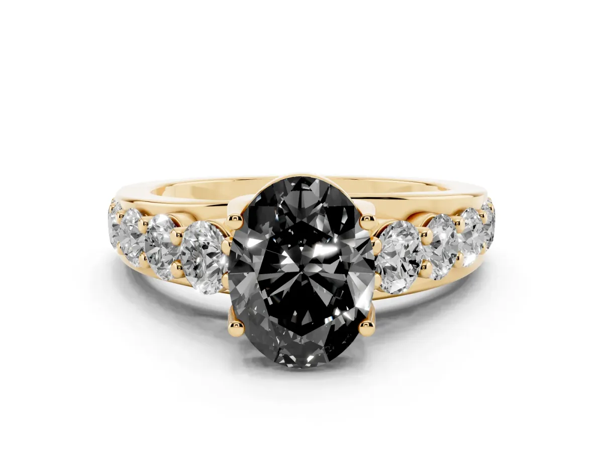 Fancy Black Oval Cut Diamond Engagement Ring with Pavé Band and Four-Prong Setting Yellow gold
