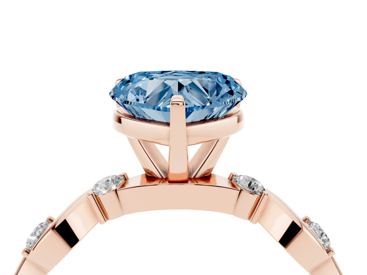 Fancy Blue Heart Cut Diamond Solitaire Twisted Band with Round Accents and Prong Setting Rose gold