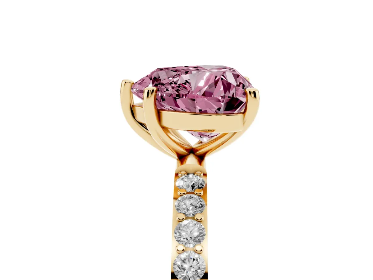 Fancy Pink Heart Cut Diamond Solitaire Ring with Round Pavé Shoulders and Prong Setting Yellow gold