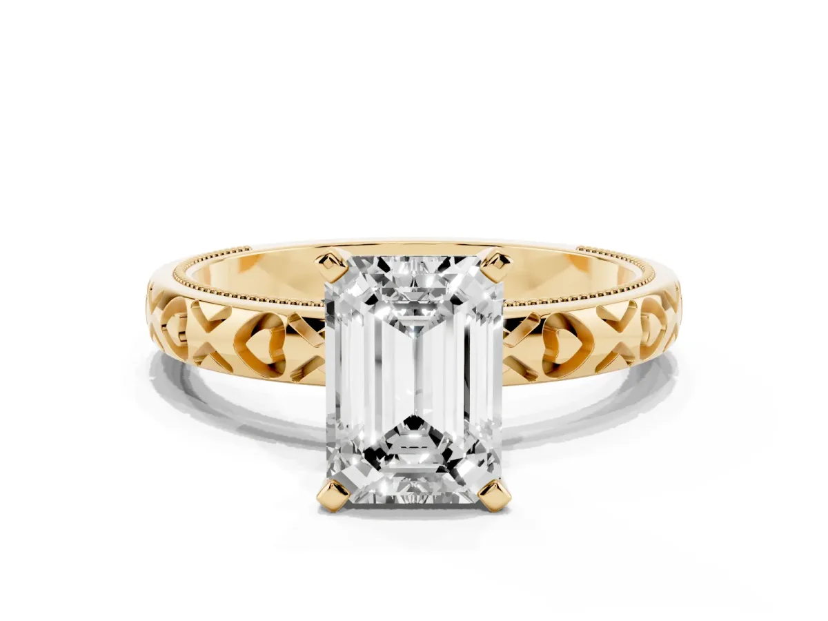 Emerald Cut Solitaire Diamond Engagement Ring with XO Engraved Band and Four-Prong Setting Yellow gold