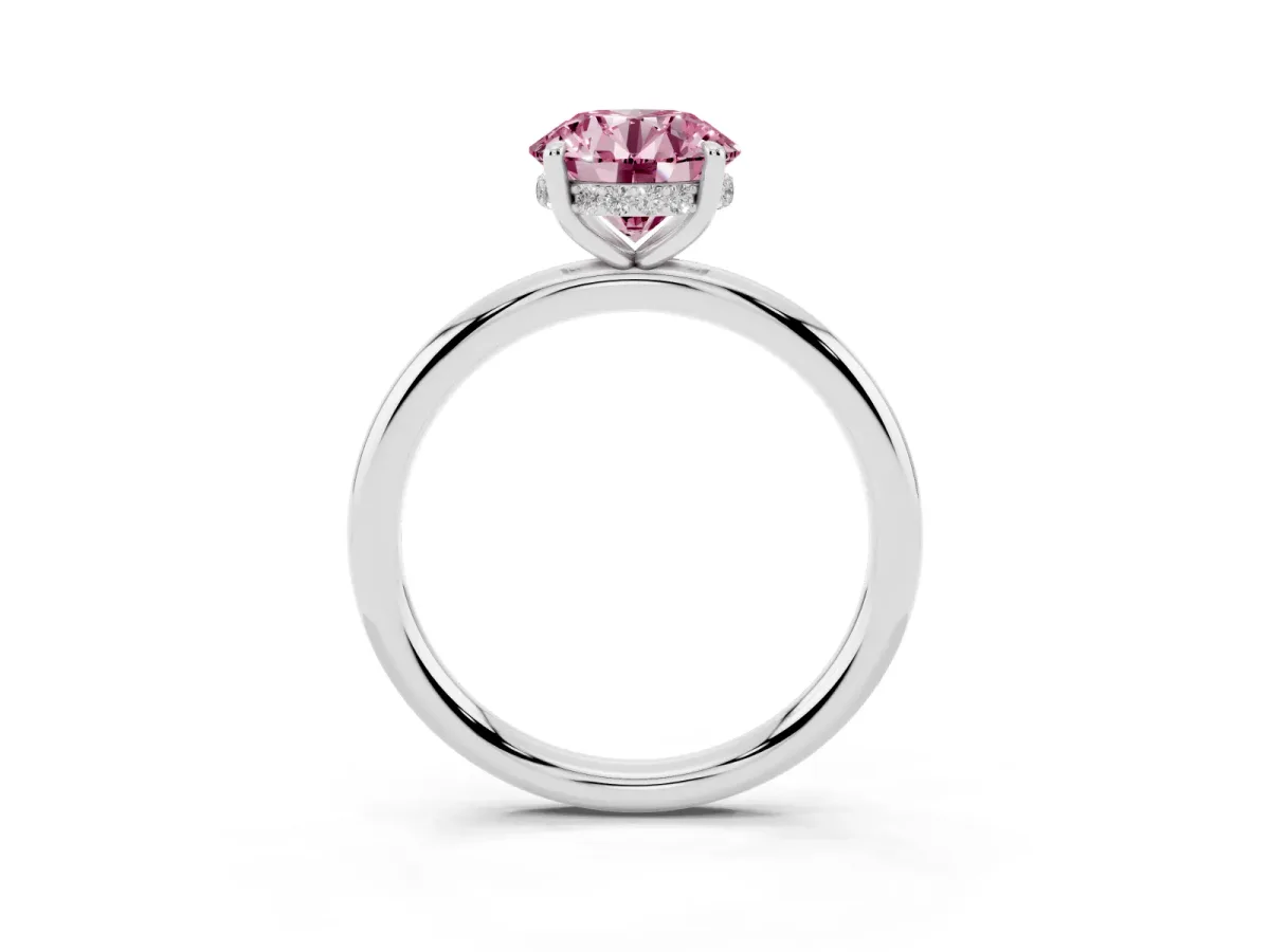 Fancy Pink Round Cut Diamond Solitaire Ring with Thin Band and Four-Prong Setting Silver